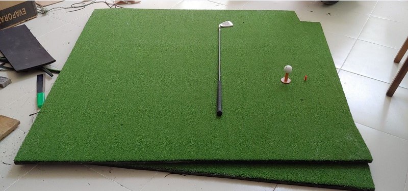 Trong phòng golf 3D không thể thiếu thảm cỏ nhân tạo